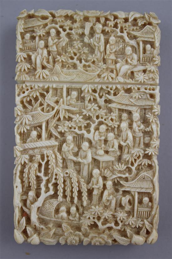 A Chinese export carved ivory card case, 19th century, 11cm, with original brocade covered card box (a.f.)